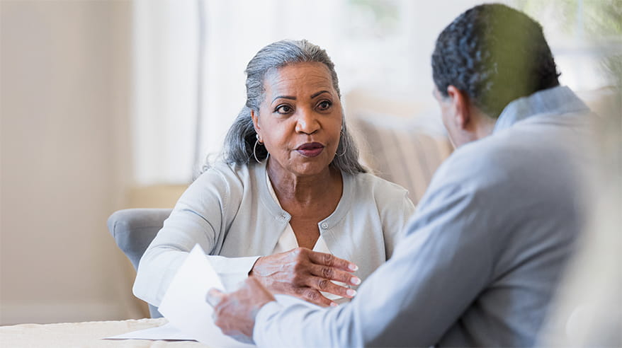 Senior couple has serious discussion about home finances